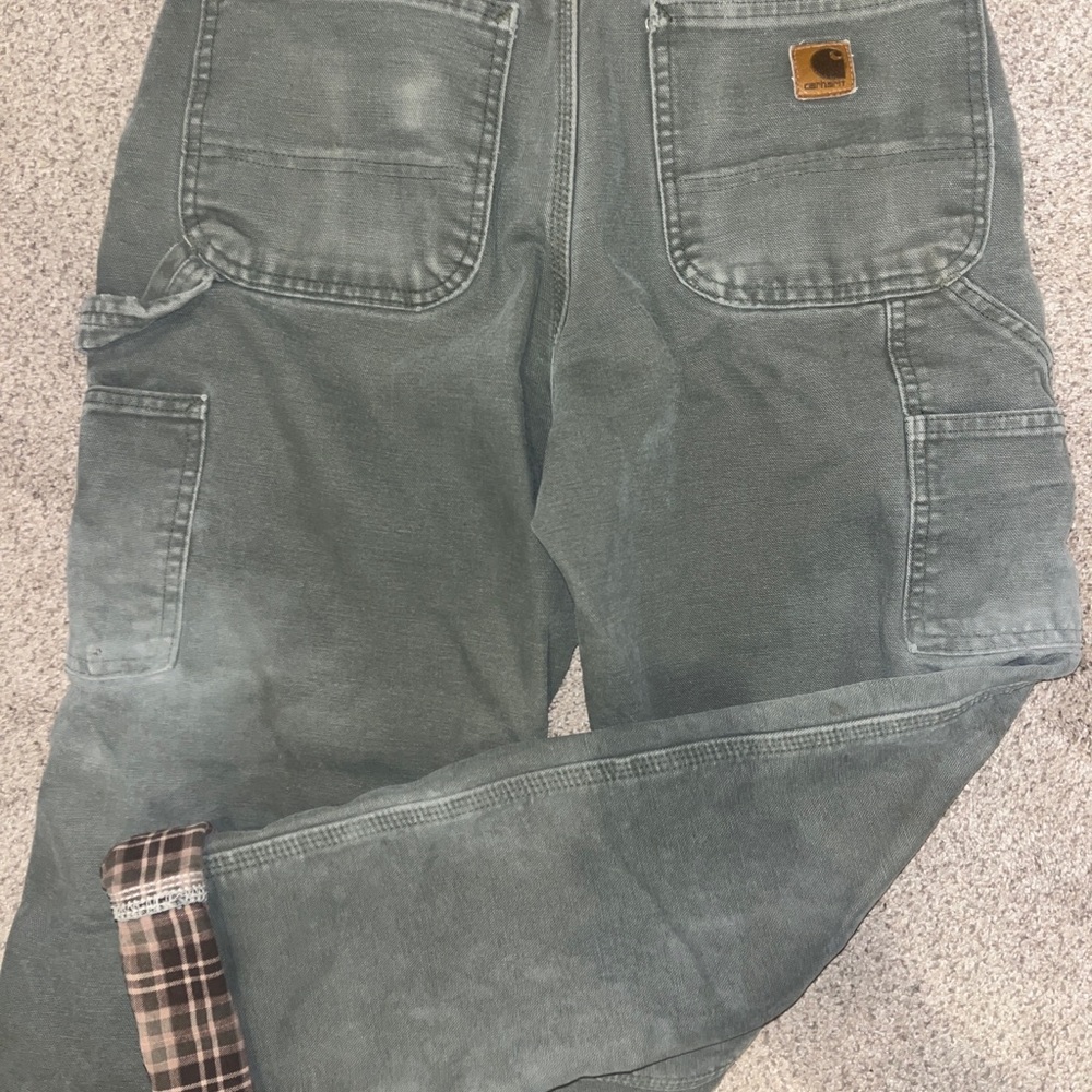 Vintage distressed flannel lined Carhartt pants,